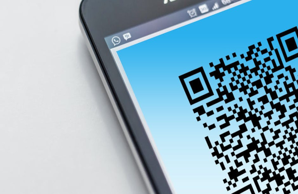 Hoe werkt een QR code precies en welke informatie zit erin verborgen